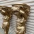 Stunning pair of extra large gilded sconces. Would be extravagant at any entryway alone or to hold large candles or...