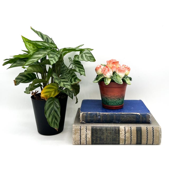 Charming vintage ceramic flower pot from Fitz and Floyd’s Forever in Bloom collection. This sculptural planter features...