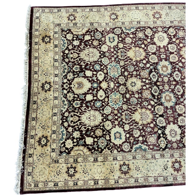 Elegant hand-knotted Oriental area rug featuring a classic Tabriz-style allover Herati pattern in rich burgundy with an...