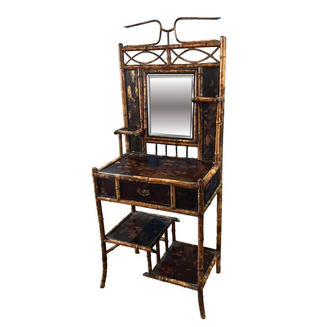 A rare and striking Victorian-era English Colonial bamboo Bonheur du Jour, crafted in the late 19th century, in the style...