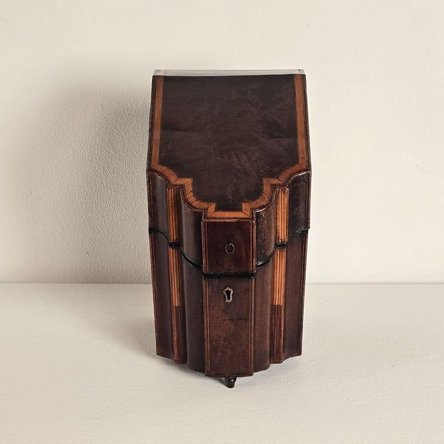 An elaborate medicinal Sheraton cutlery box with four large cubbies for bottles.