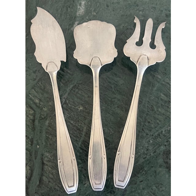 Vintage three piece fish serving set made by Félix Frères in Toulouse France in the 1940's. Félix Frères was a company...