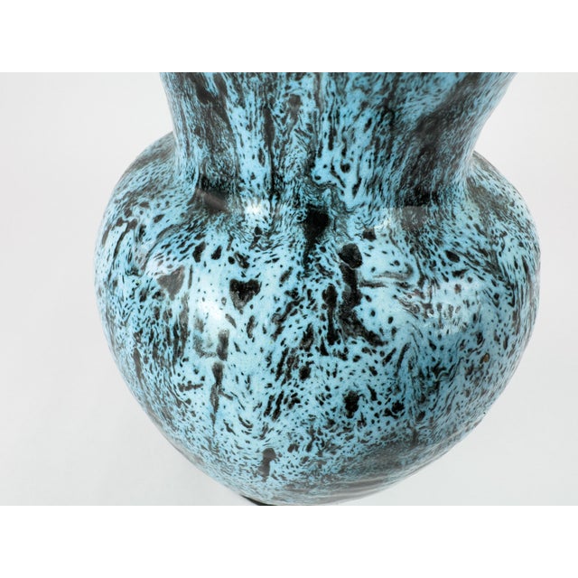 A striking French mid-century ceramic vase by Accolay, dating to the 1950s–1960s. This sculptural form features a flared...