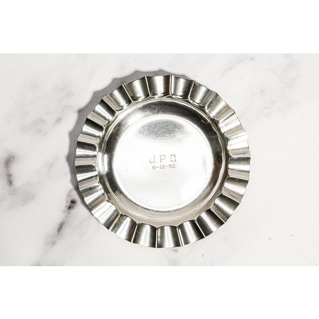 A handsome example of mid-century sterling silver design, this vintage ashtray combines clean modern lines with an...
