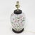 A beautifully crafted vintage Chinese porcelain ginger jar lamp adorned with a delicate hand-painted floral and vine...
