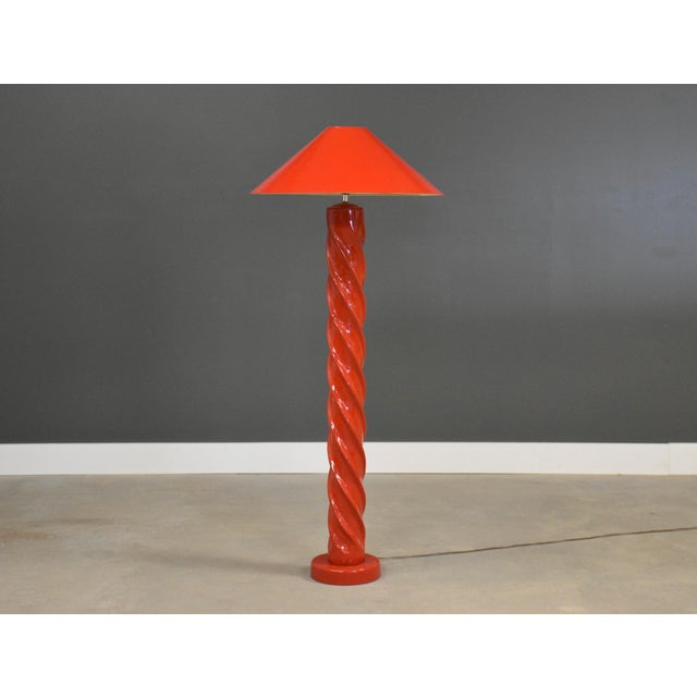 A modern floor lamp in vibrant red. In the style of Michael Taylor. Some minor shown in shade. Overall excellent...
