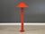 A modern floor lamp in vibrant red. In the style of Michael Taylor. Some minor shown in shade. Overall excellent...