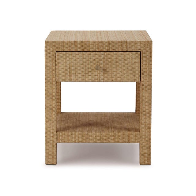 Wrapped in natural rattan, this stunning table combines modern design with coastal charm. It features spacious drawers for...