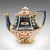 This is an antique Imari pattern teapot. An English, ceramic decorative tea kettle, dating to the late Victorian period,...