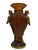 Amber resin vase with gold-accented parrot and feathered texture, a striking decorative element for any interior setting....