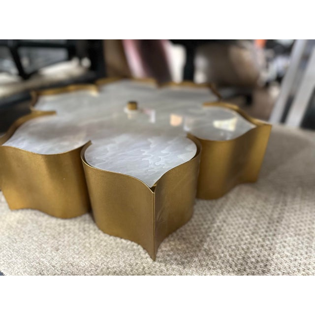 "The Grand Lotus Gold Flush Mount receives its majestic good looks from a combination of stunning workmanship and its...