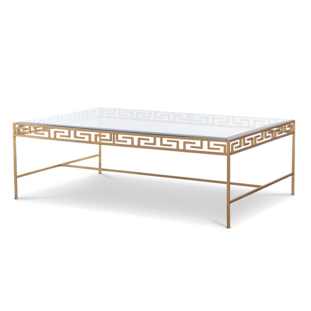 Gold leaf finish on iron base with stretcher and glass top
