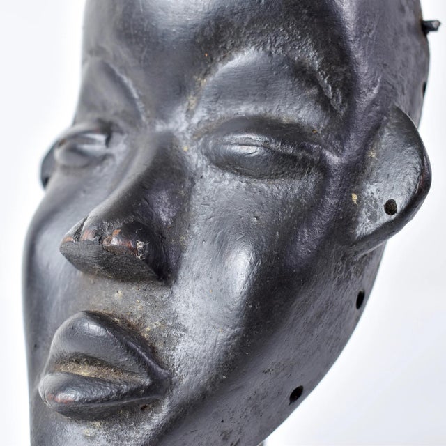 Embark on a journey of cultural exploration with our Dan Deangle Passport Mask. Handcrafted by skilled artisans from the...