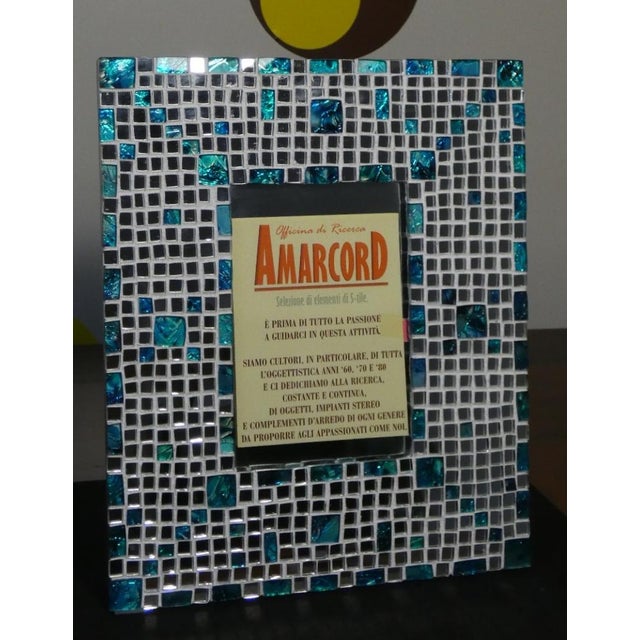 Restoration of a table mirror with the possibility of also being used as a photo frame. On the back of the base there are...