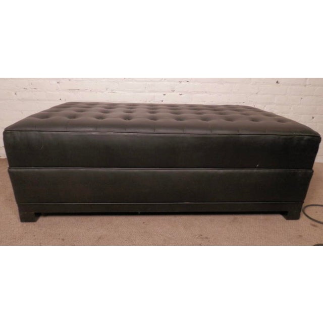 Mid-Century Modern large black leather ottoman. Comfortable tufted top, perfect addition to any living room. (Please...
