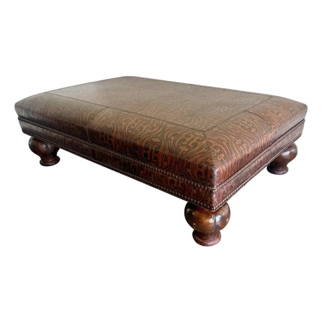 Spanish Colonial Style Embossed Leather Ottoman With Bun Feet For Sale