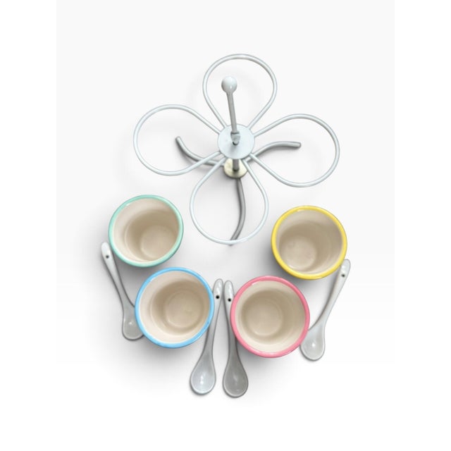 Playful vintage rotating dessert caddy featuring four colorful ceramic cups designed in the shape of classic ice cream...
