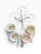 Playful vintage rotating dessert caddy featuring four colorful ceramic cups designed in the shape of classic ice cream...