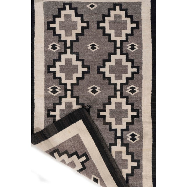 As perpetually fashionable as they are collectible, traditional Navajo style rugs, skillfully woven , are similar to...