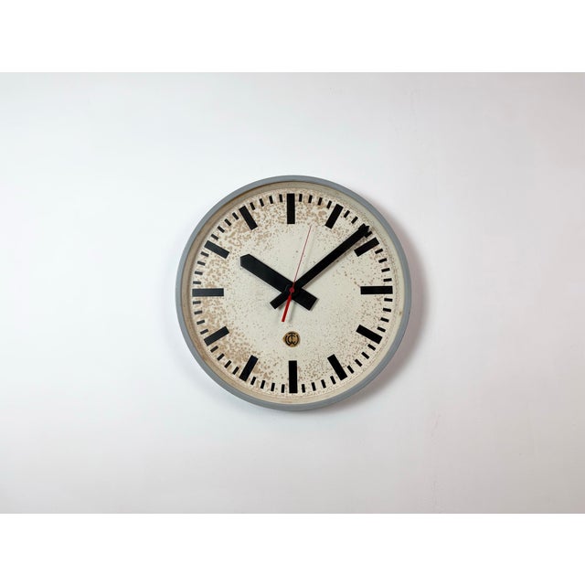 This station wall clock was made by CTW (Carl Theodor Wagner) in Wiesbaden, West Germany during the 1960s. It features a...
