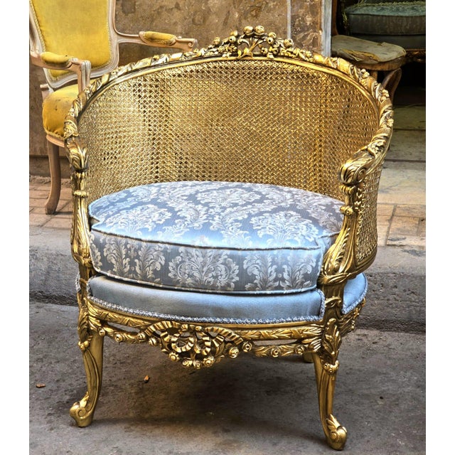 Bring timeless elegance into your home with this breathtaking Baroque style armchair featuring luxurious sky blue damask...
