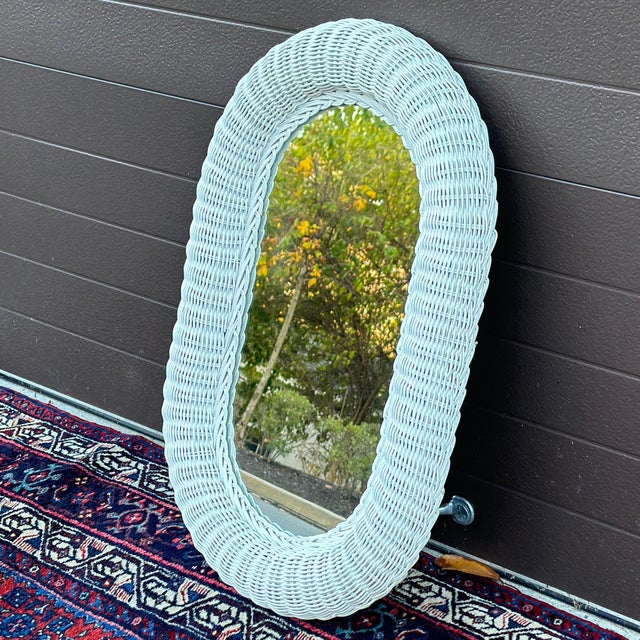Wicker is on trend and this is a perfect vintage mirror for a petite powder room or otherwise. The white color works with...