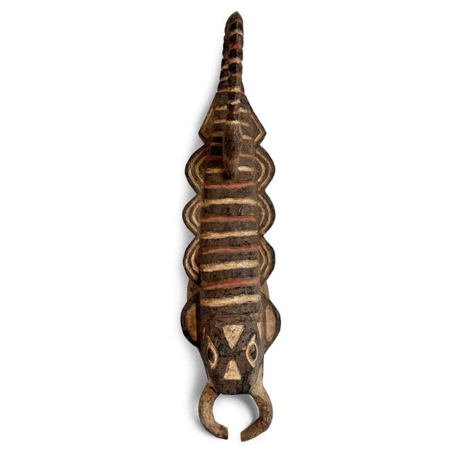 Amazing old Bwa zoomorphic scorpion mask from Burkina Faso. This special piece embodies the powerful West African visual...