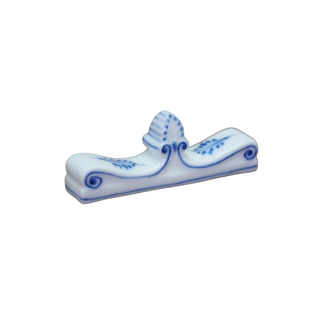 Antique porcelain knife rest #134 (Messerbänkchen or Musselmalet) in the Blue Fluted pattern made by Royal Copenhagen in...