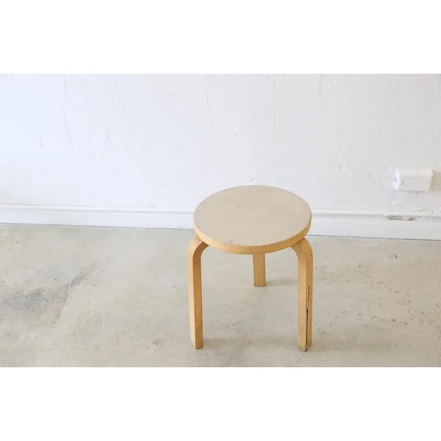 This pre-loved gray Alvar Aalto stool is a classic addition to any room. The Stool 60 was designed in 1933 by Finnish...