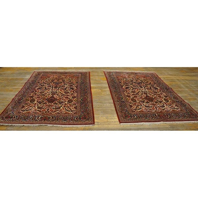 This exquisite 1920 Antique Kashan Formal rug showcases the master weaving traditions from the early 20th century....
