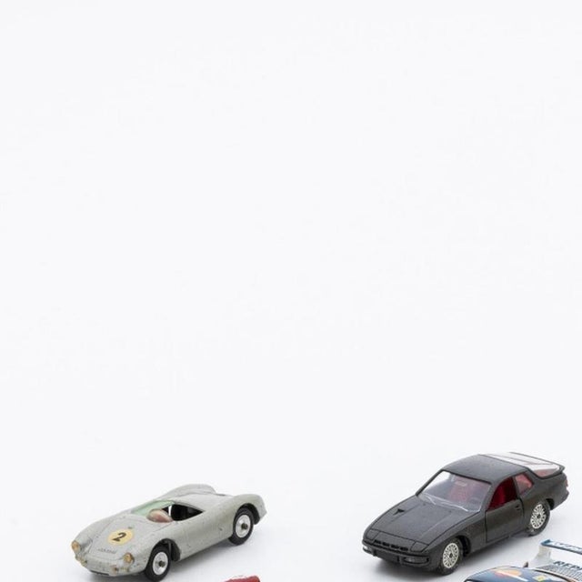 Toys - ten miniature porsche cars. European cars from the 20th century, made of metal and other materials, comprising:...