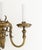 Pair of Dutch Style Bronze Three-Branch Wall Sconces, with orb form backing plate and scroll motif. 15.25" H x 15.5" W x...