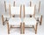 A simple, yet elegant, set of 4 Danish modern dining chairs. The chairs are of solid carved / figured oak and are...