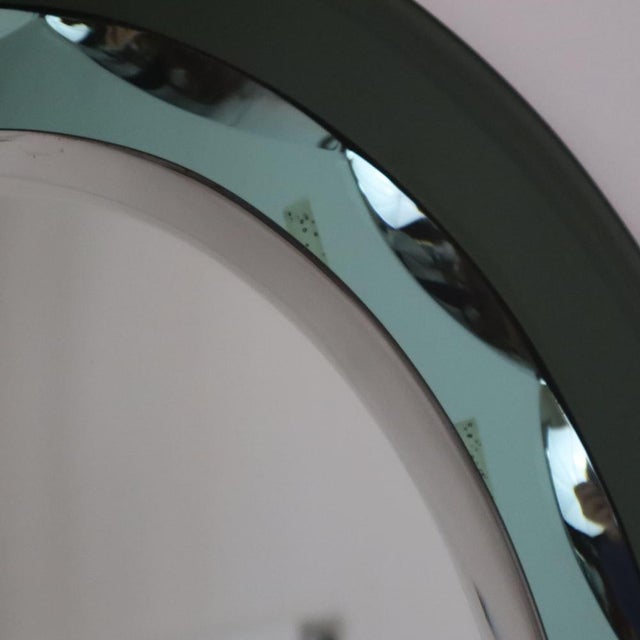 Three-level oval mirror in the Cristal Art style, Italy, 1960s This stunning oval mirror is a fine example of the...