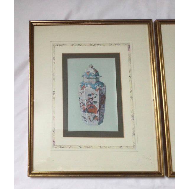 A pair of 1910 framed prints of Asian porcelain in giltwood frames. Beautifully matted in French matts.