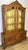 This elegant Vintage French Louis Oak Bookcase is a beautifully crafted display cabinet featuring graceful curved glazing,...