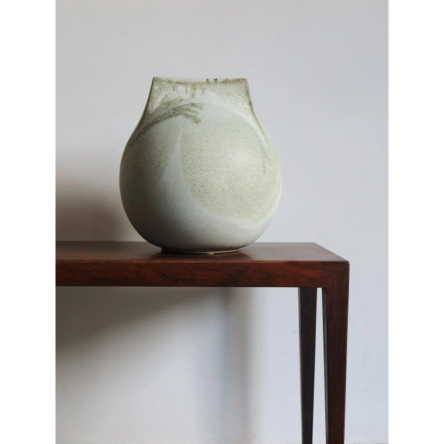 Large stoneware vase designed and produced by Franco Bucci Pesaro branded under the base, 70. This piece has an...