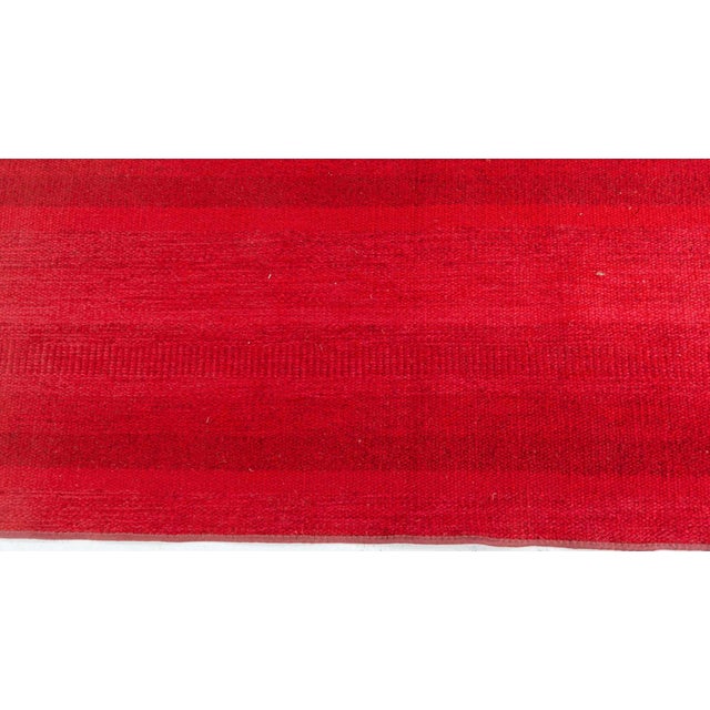 Vintage Swedish Fragment Runner in Red Tones Size: 2'0" × 8'10" (60 × 269 cm) This captivating Swedish fragment runner...