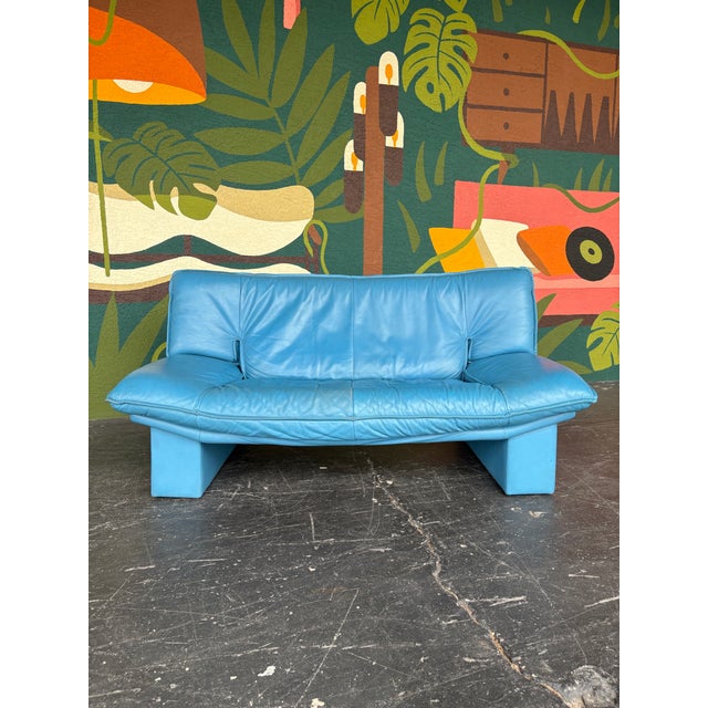 Vintage Teal Blue Post Modern Nicoletti Salotti Italian Leather Loveseat. Long sculptural frame with a fun pop of color....