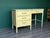 1970’s Faux Bamboo Canary yellow desk of four drawers with metal hardware and Formica top. This desk is part of the Bali...