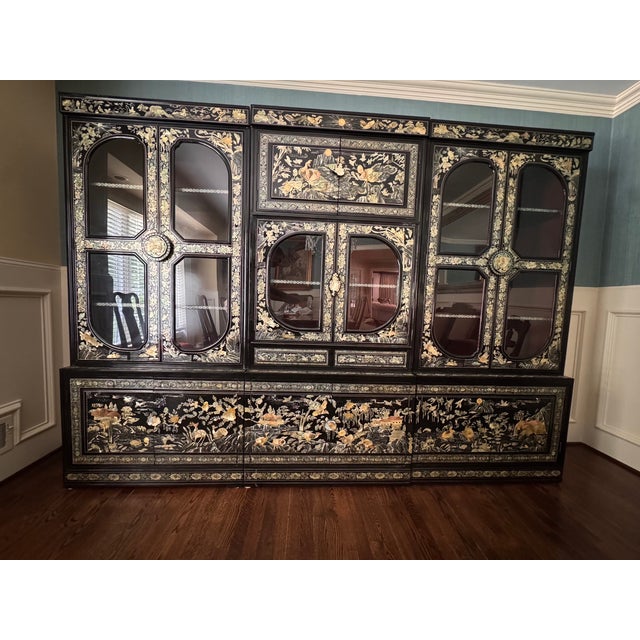 A stunning 3 unit cabinet display in the traditional Korean art form called “Najeonchilgi” with genuine mother of pearl...