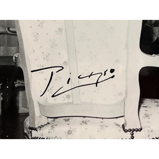 Francis Bay Pablo Picasso with family, (circa 1957) Beautiful intimate scene of Pablo Picasso surrounded by his partner,...