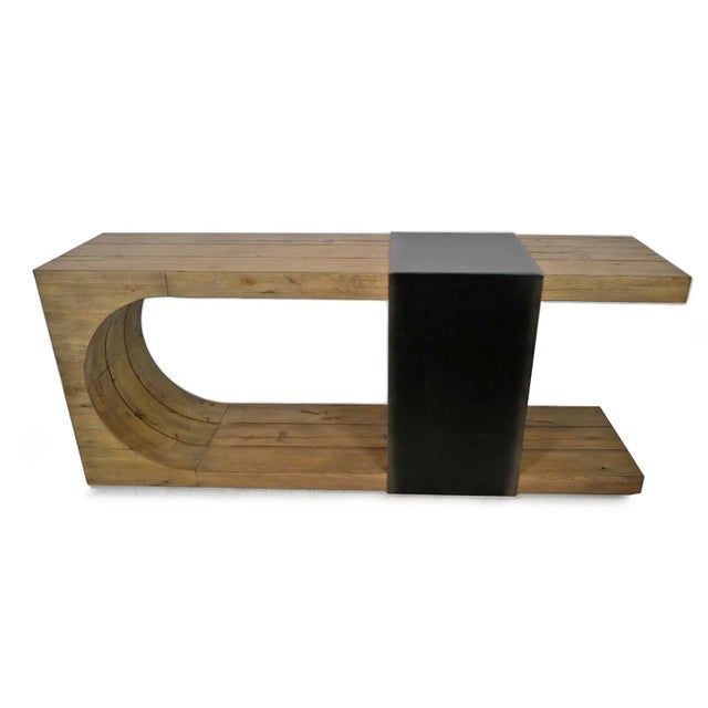 Striking U shaped solid reclaimed oak wood console table with steel tie wrap. Minimalist retro style with unique...