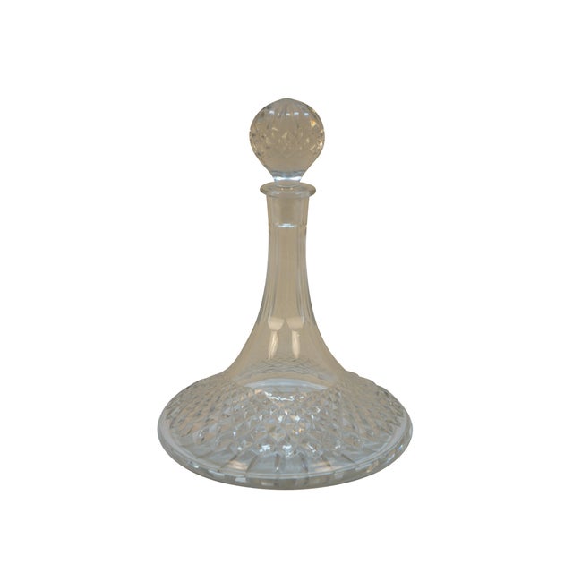 Late 20th century Waterford clear cut crystal ship's whiskey decanter with stopper in the Lismore pattern. Dimensions:...