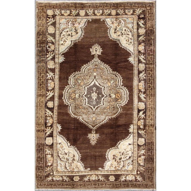 Mid 20th Century Brown Background Floral Medallion Vintage Turkish Kars Rug in Ivory and Taupe For Sale