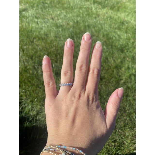 Stones: diamond, 10 round brilliant cut 3 mm approximately 1 total carat GH color/ VS2-SI1 clarity Ring Size 6 Rise Off Of...