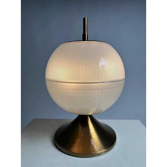 Rare Mid-century Italian table lamp in metal and glass, attributable to the famous architect and designer Ignazio...