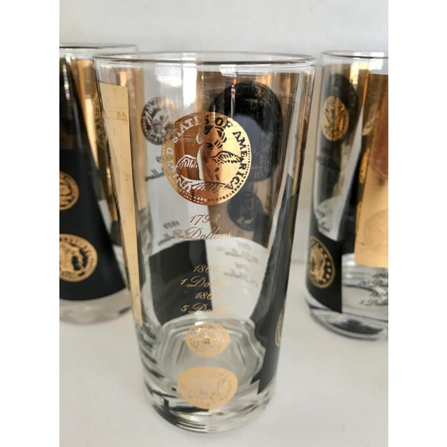 This is a fantastic set of glasses by Cera from the mid-century, which feature coin details in black and 22k gold! There...