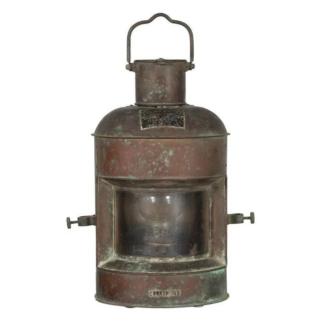 A Japanese metal ship's navigation stern light from the mid 20th century, made by Nippon Sento Co, ltd, with oxidized...