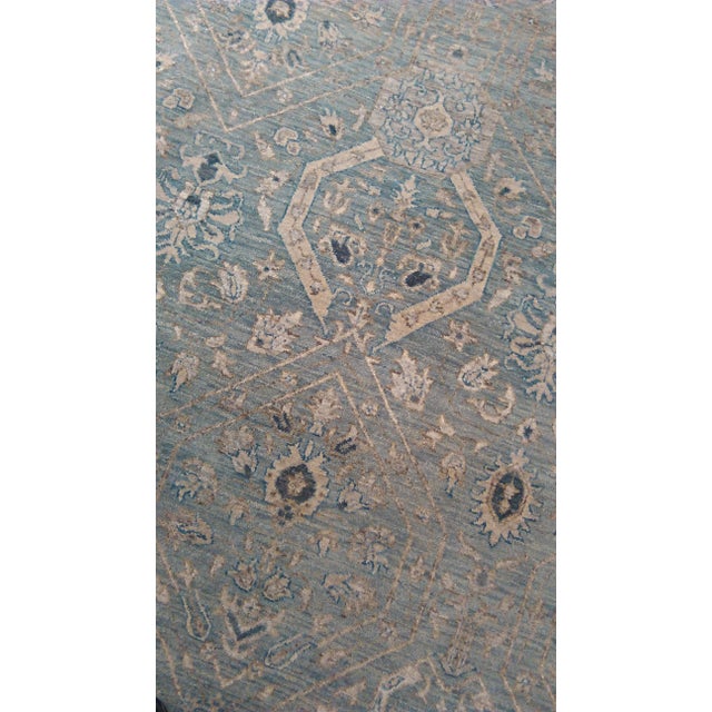 Origin: India Size: 6' x 9' Design: Farahan Material: Wool Primary Color: Sky Blue Secondary Color: Ice Description: Hand-...